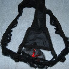 Wife wearing kinky black thongs  