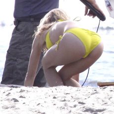 Asses of girls at beach wearing bikini panties - part 2 