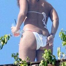 Asses of girls at beach wearing bikini panties - part 2  