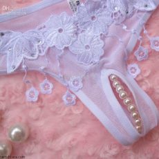 G-thongs with pearls - kinky panties with jewelry on the vagina 