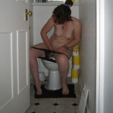 Amateurs sitting on the toilet with lowered panties Amateurs sitting on the toilet with lowered panties