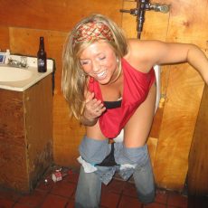 Amateurs sitting on the toilet with lowered panties 