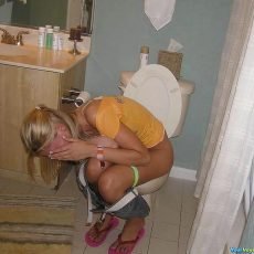 Amateurs sitting on the toilet with lowered panties Amateurs sitting on the toilet with lowered panties