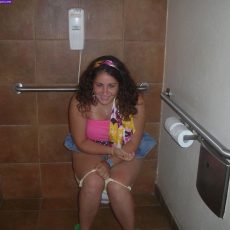 Amateurs sitting on the toilet with lowered panties Amateurs sitting on the toilet with lowered panties
