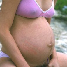 Pregnant girls posing in lingerie Pregnant girls posing in lingerie